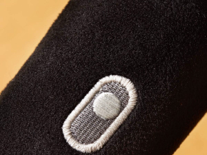 detail embroidered button on microphone dog toy